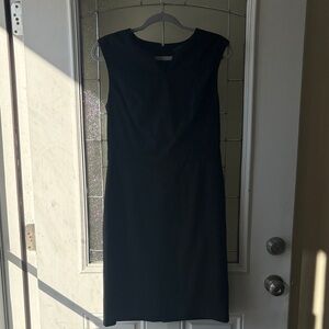 The limited Black Midi Dress
